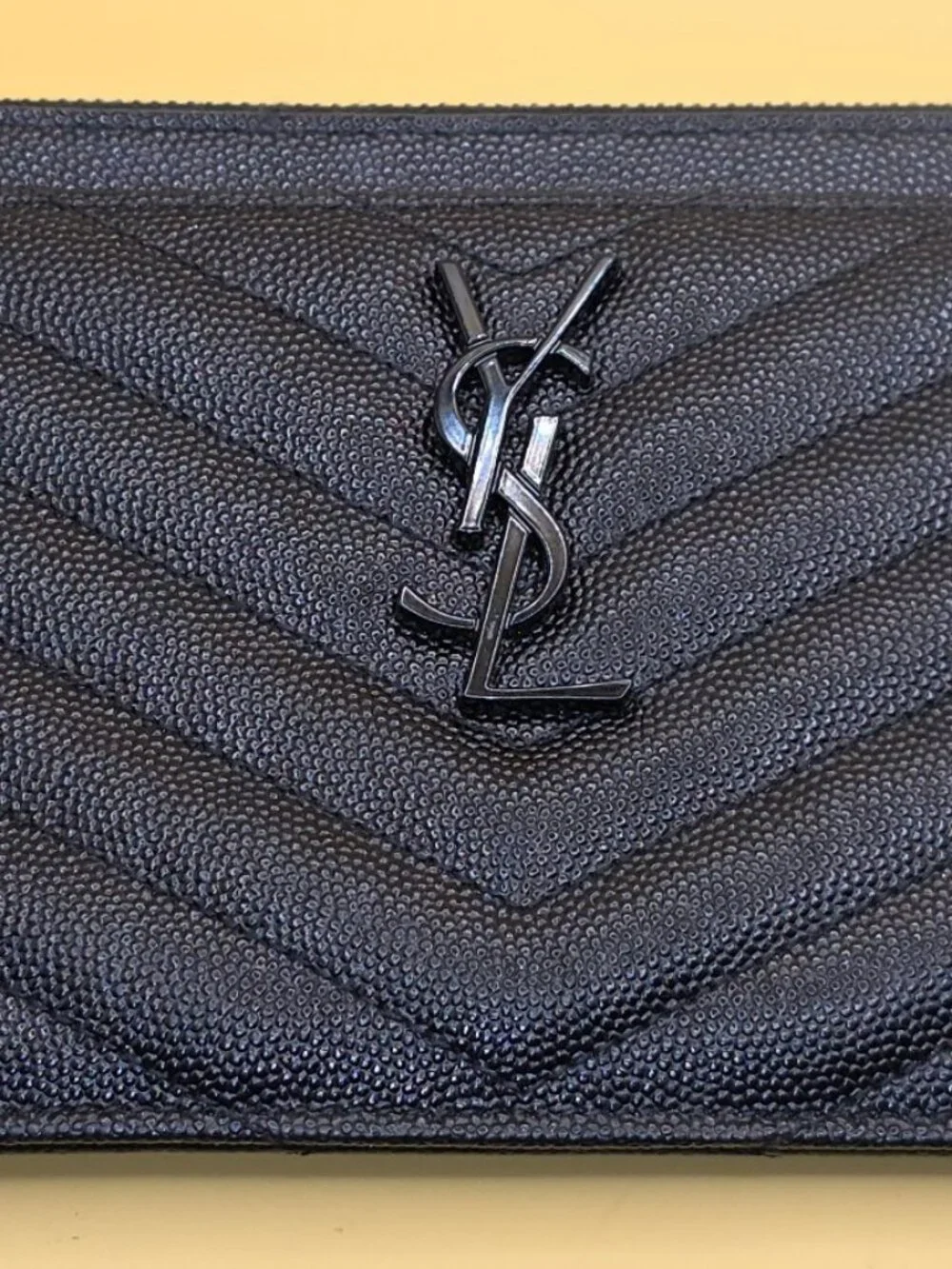 St. Laurent Quilted Zip closure